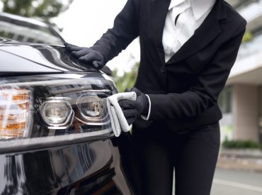 taxi-driver-cleaning-her-car